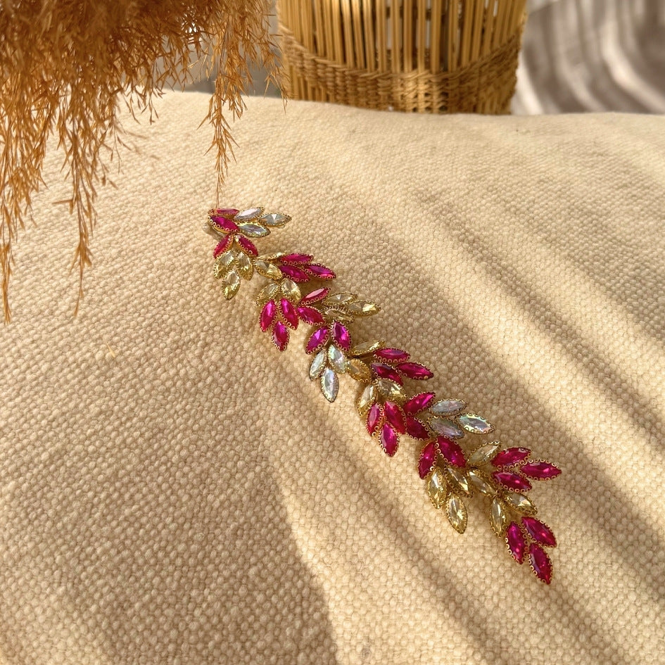 Broche feuillage fuchsia et doré