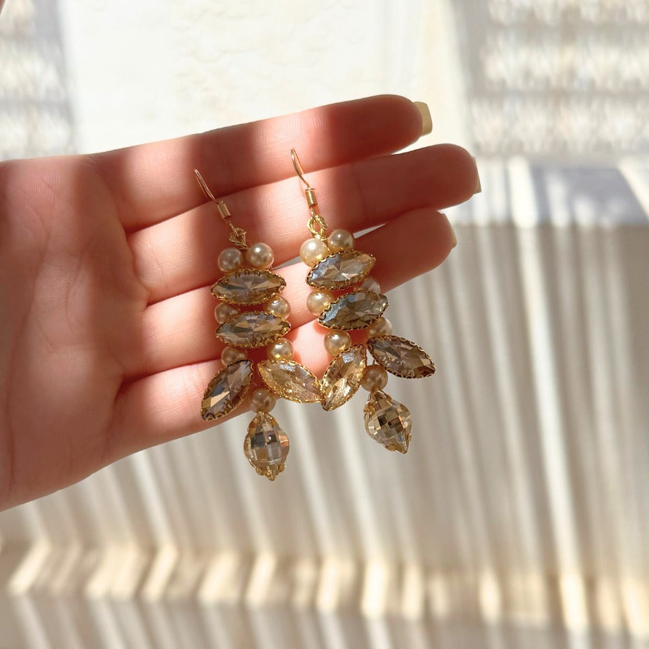 Boucles d’oreilles cascade dorée en cristal