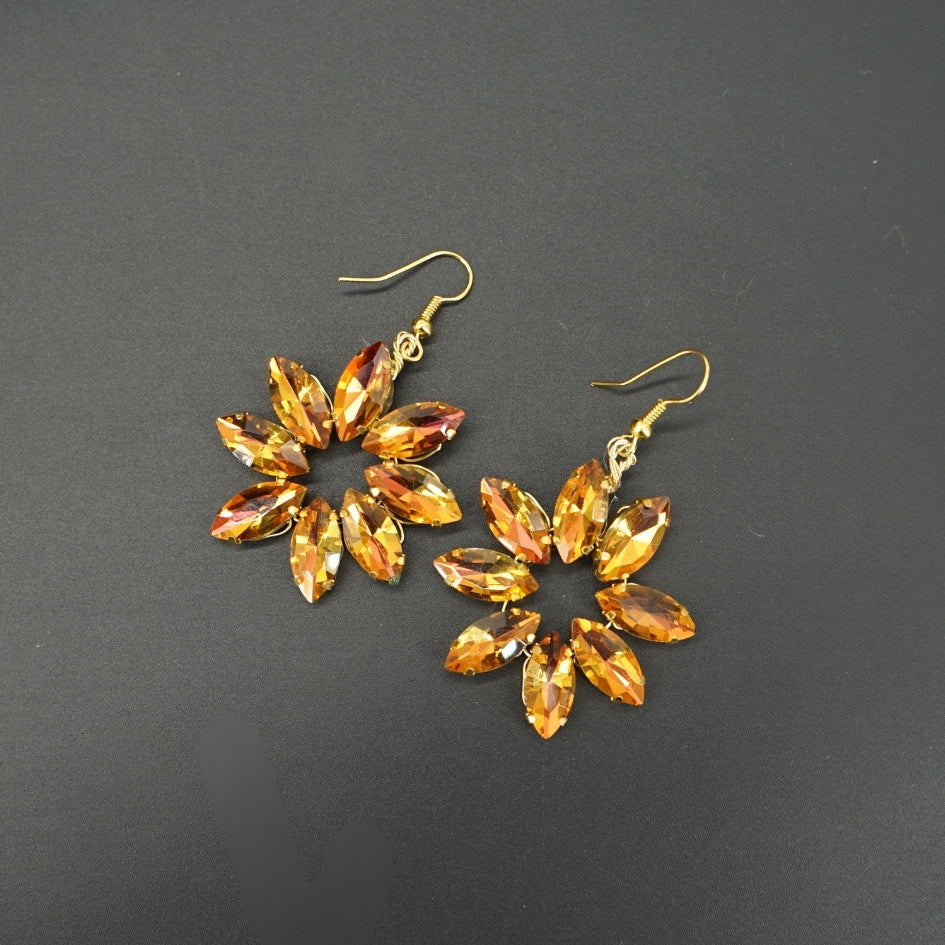 Boucles d’oreilles pendantes fleurs doré