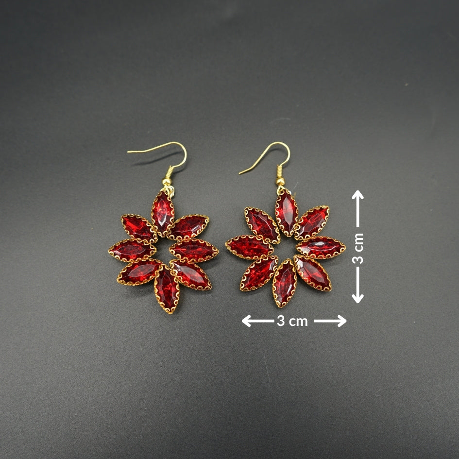 Boucles d'oreilles scintillantes avec design floral en strass rouge vif