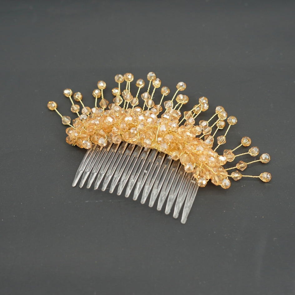 Broche dorée et beige modèle Peigne en cristal