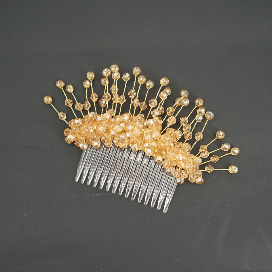 Broche dorée et beige modèle Peigne en cristal