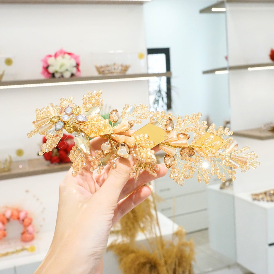 Broche dorée modèle swarovski de mariage