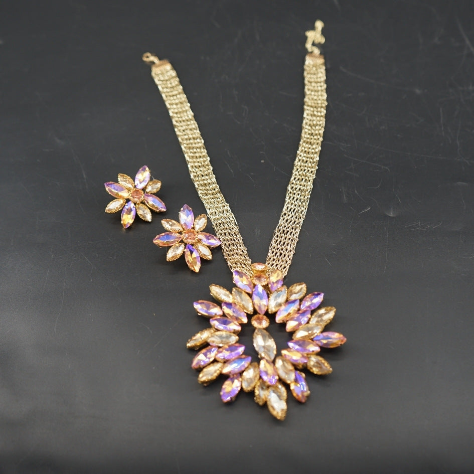 Collier doré violet cristaux floral luxe