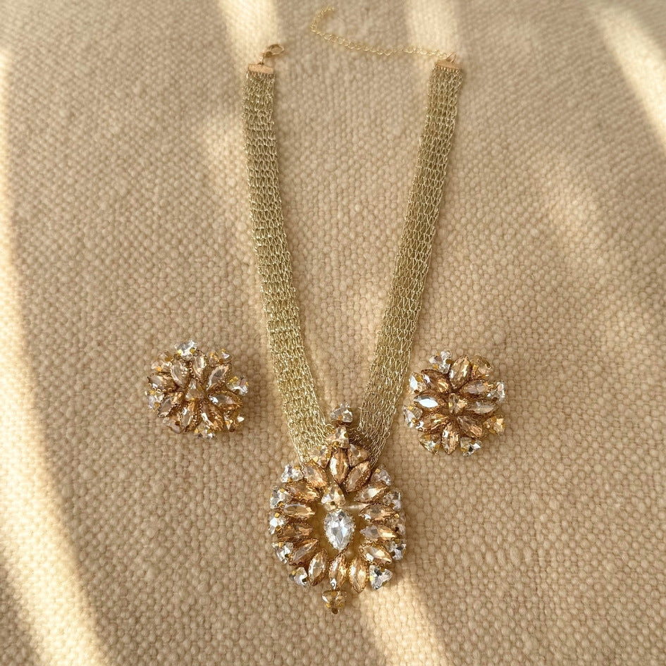 Collier doré cristaux champagne luxe