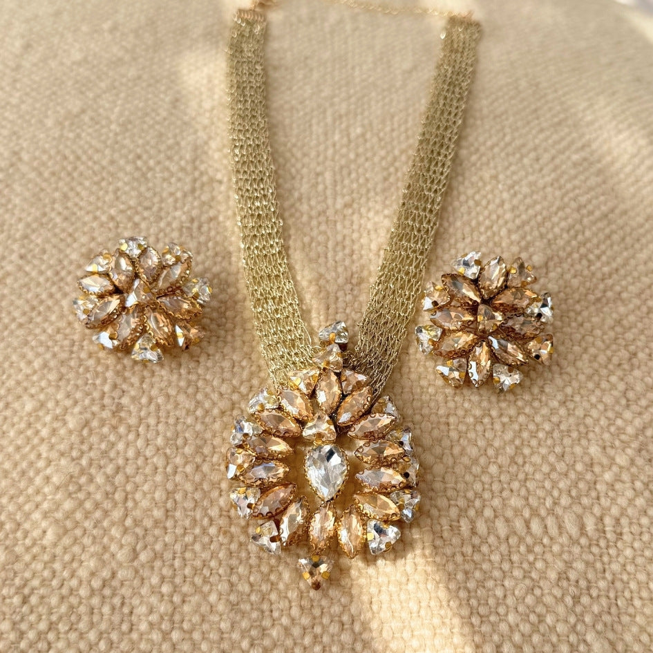 Collier doré cristaux champagne luxe