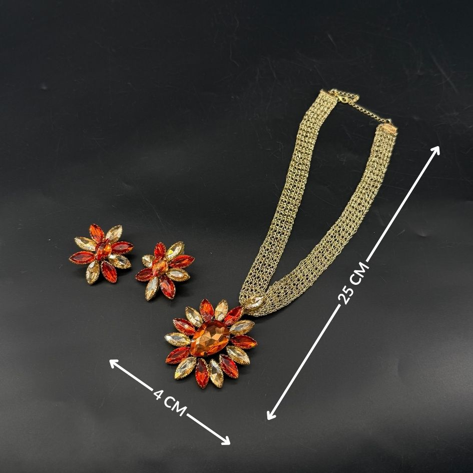 Parure collier et boucles d’oreilles dorée avec cristaux orange