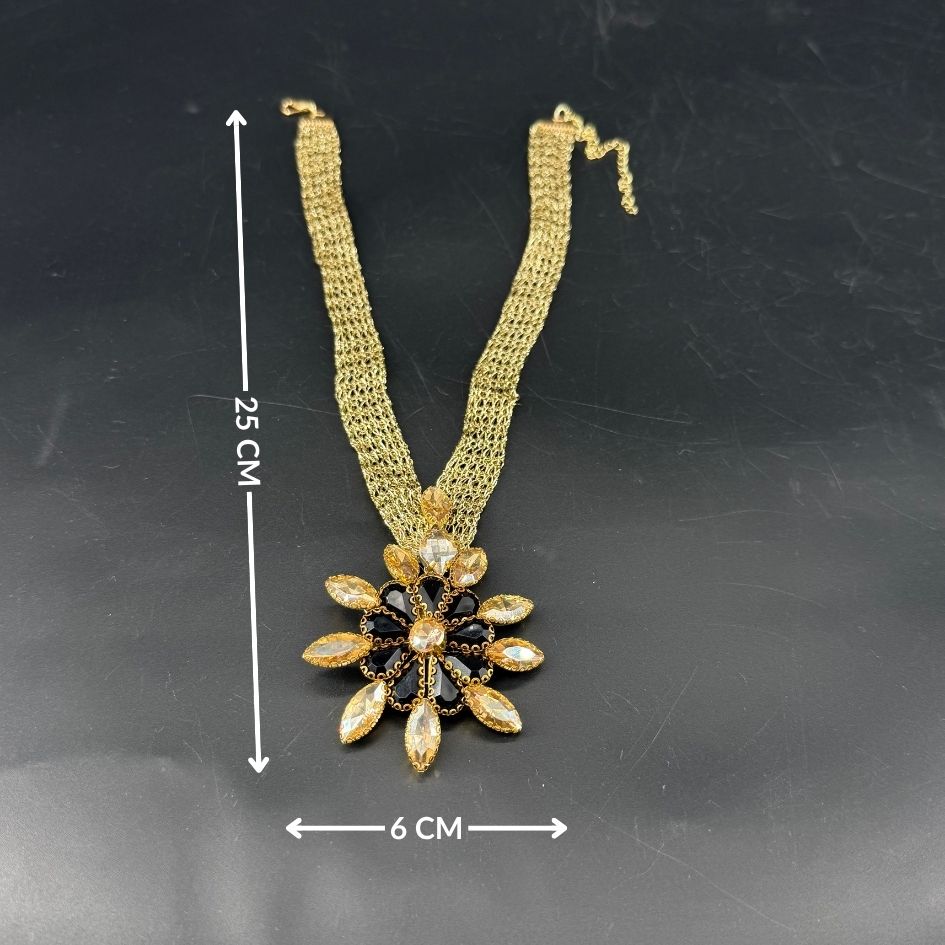 Parure collier et boucles d’oreilles dorée noire avec cristaux champagne