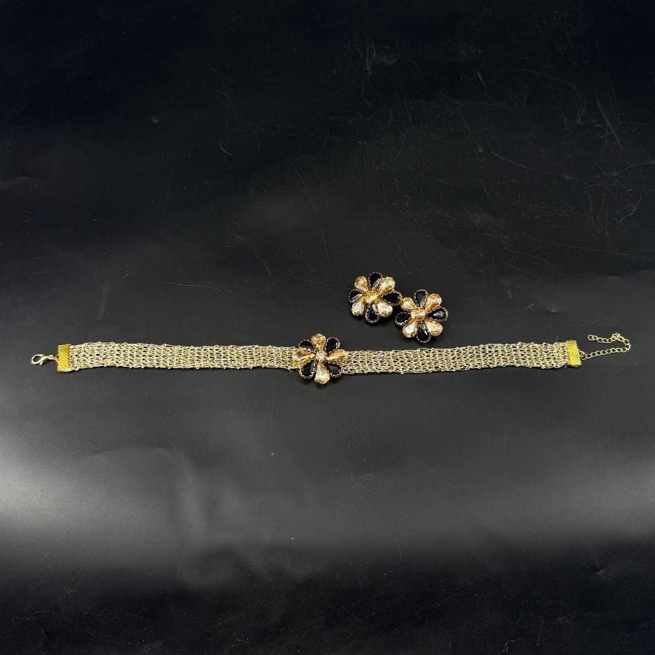 Parure collier choker et boucles d’oreilles dorée noire avec cristaux champagne