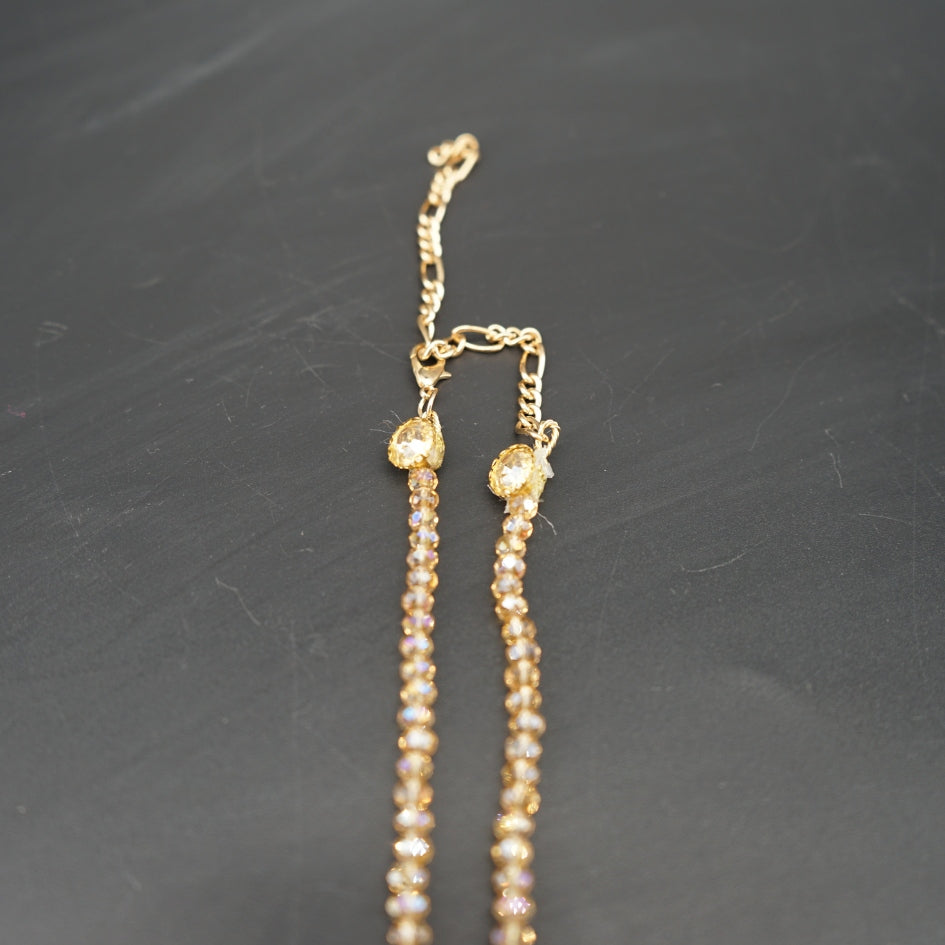 Collier et boucles d’oreilles étoile dorée pour cérémonie ou soirée