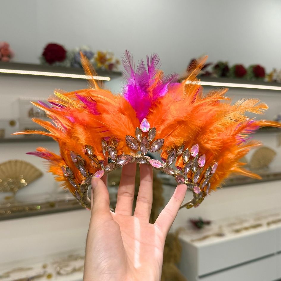 Couronne festival à plumes orange et fuchsia avec cristaux