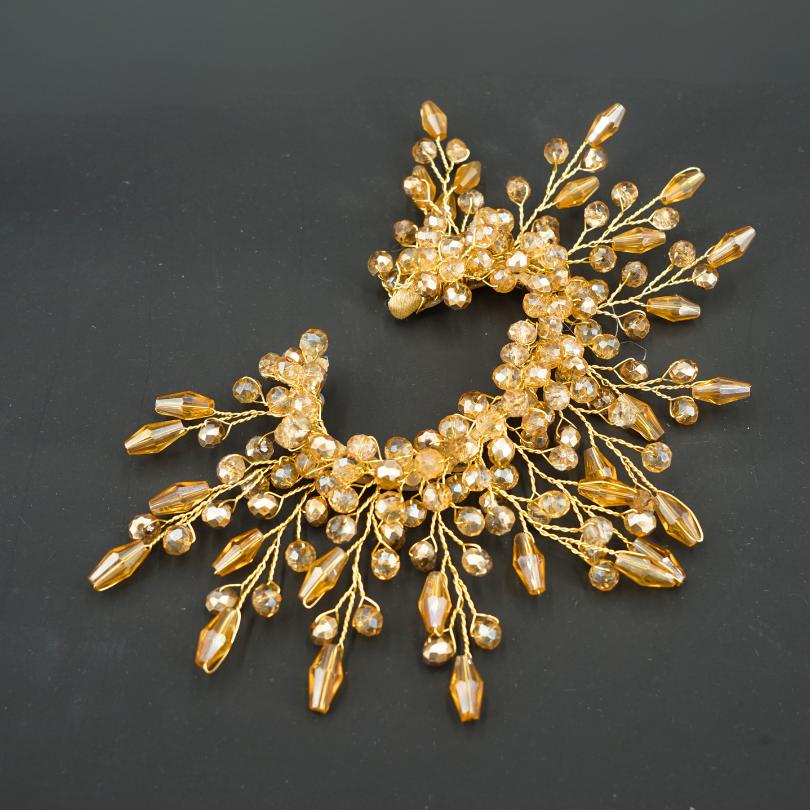 Broche/Boucles d’oreilles dorée, modèle soleil