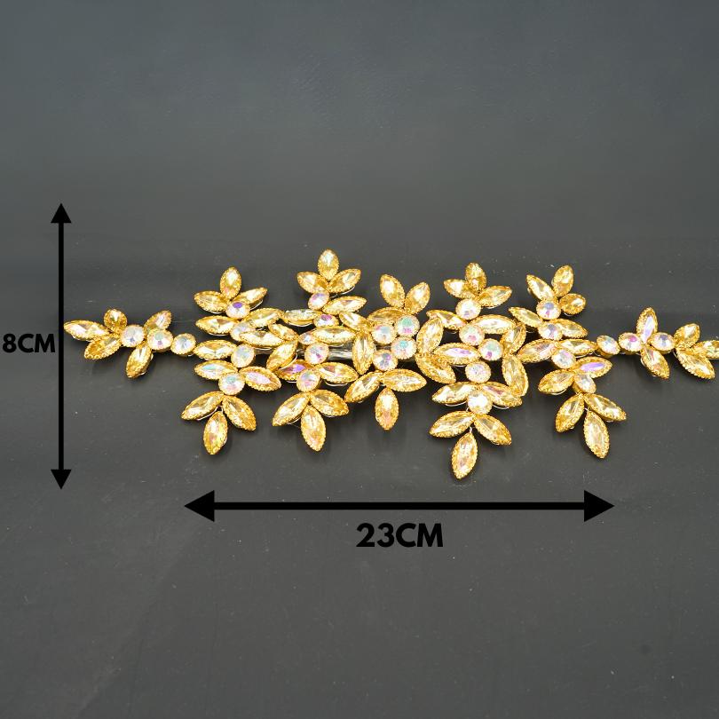 Broche dorée, modèle plante