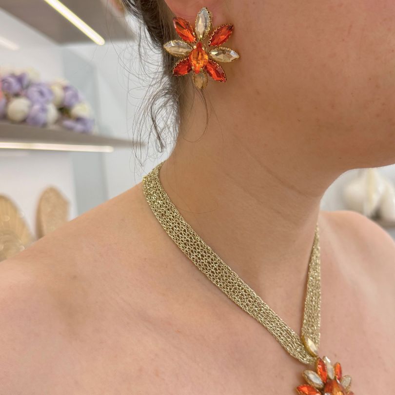 Parure collier et boucles d’oreilles dorée avec cristaux orange