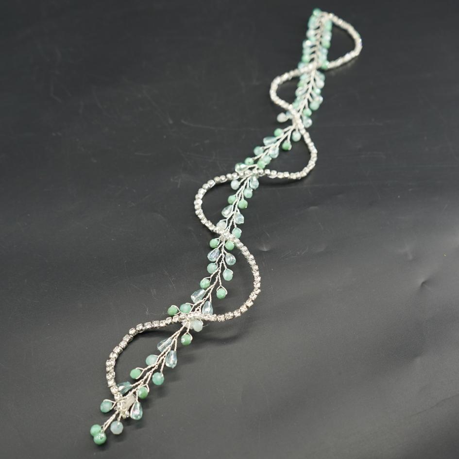 Broche verte élégante