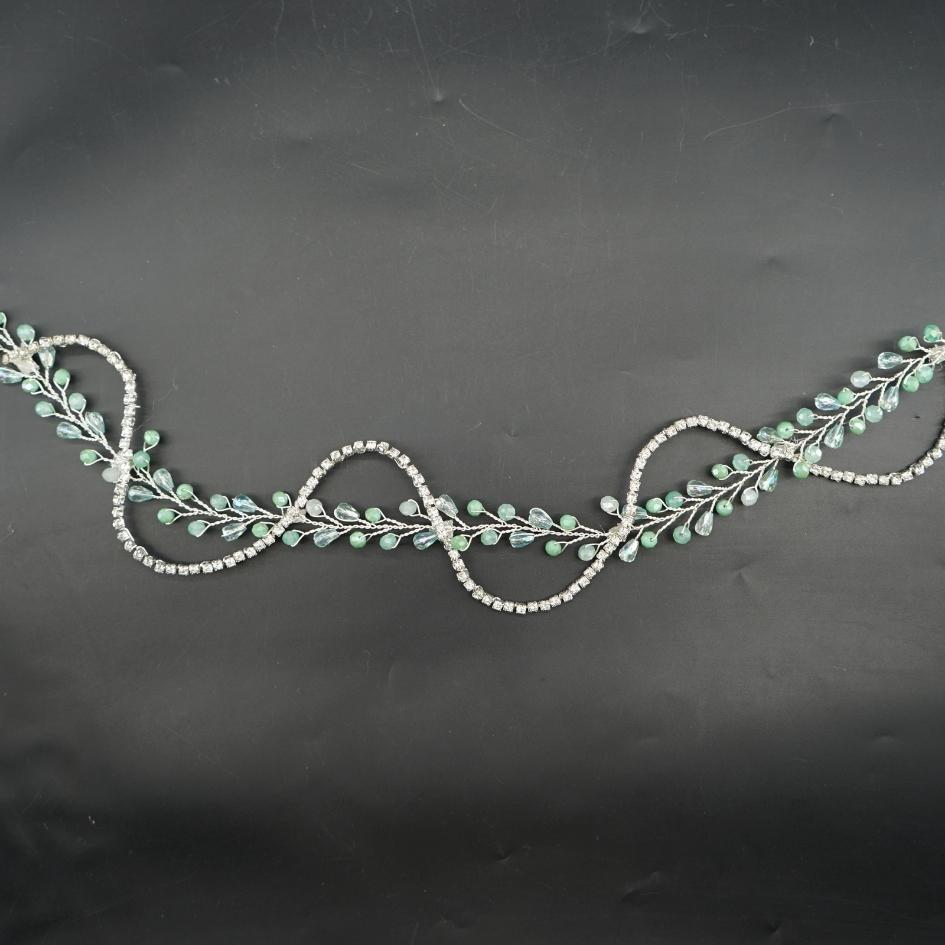 Broche verte élégante