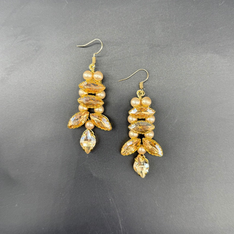 Boucles d’oreilles cascade dorée en cristal