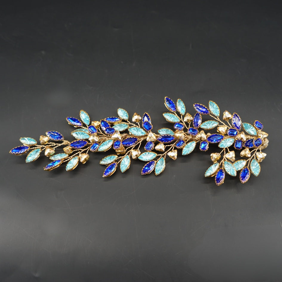 Broche florale bleue dorée élégante
