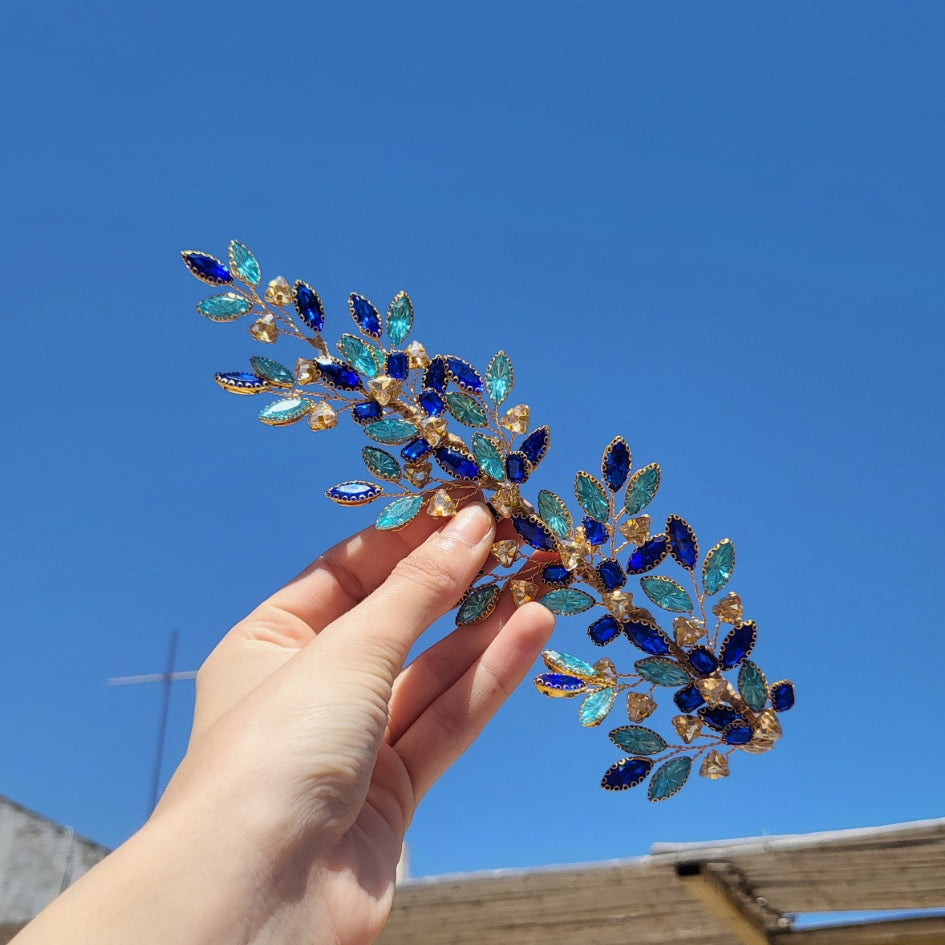 Broche florale bleue dorée élégante
