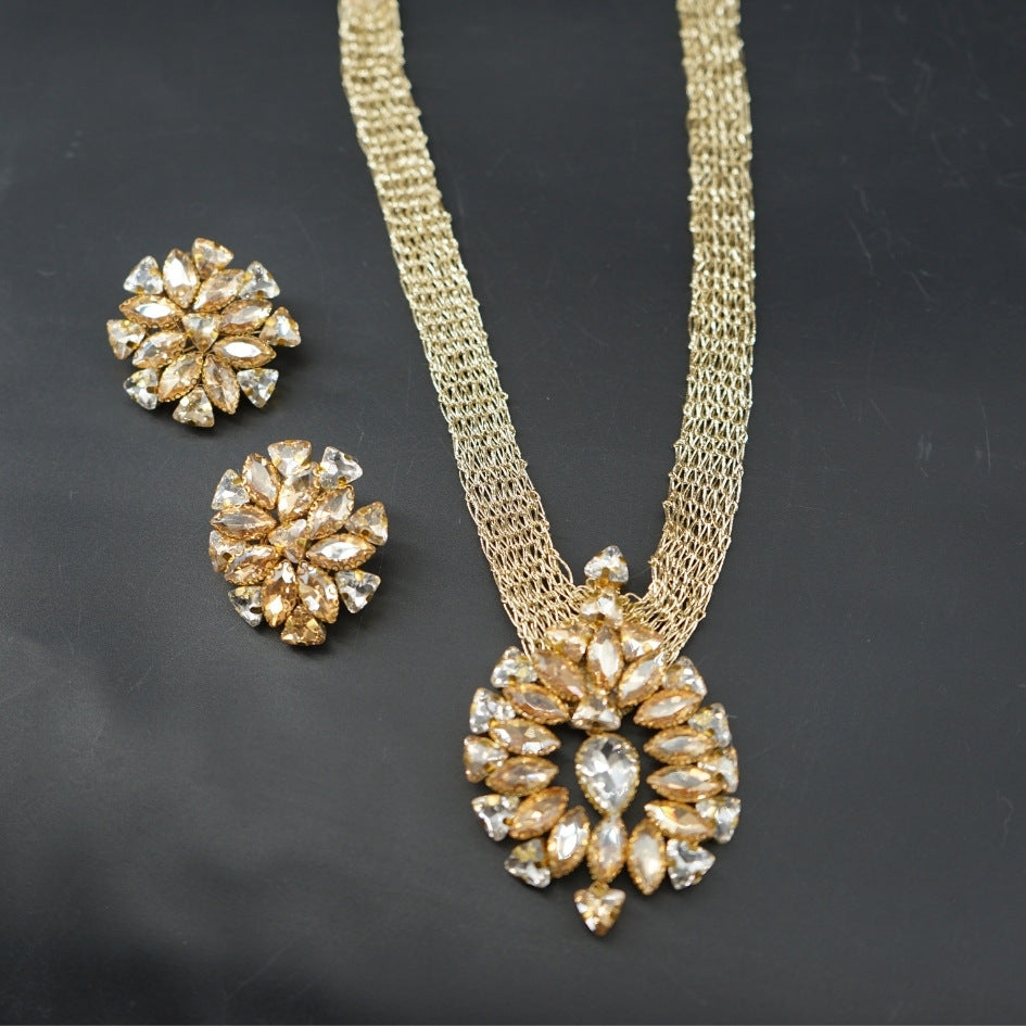 Collier doré cristaux champagne luxe