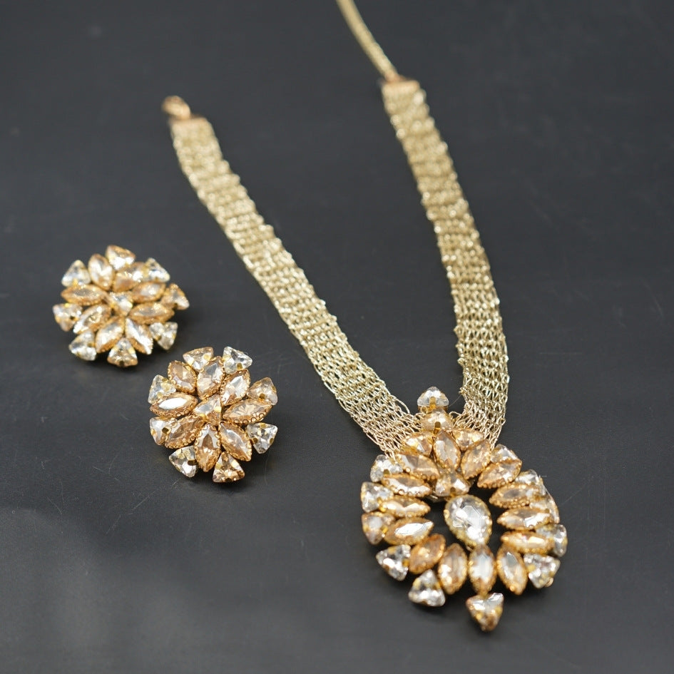 Collier doré cristaux champagne luxe