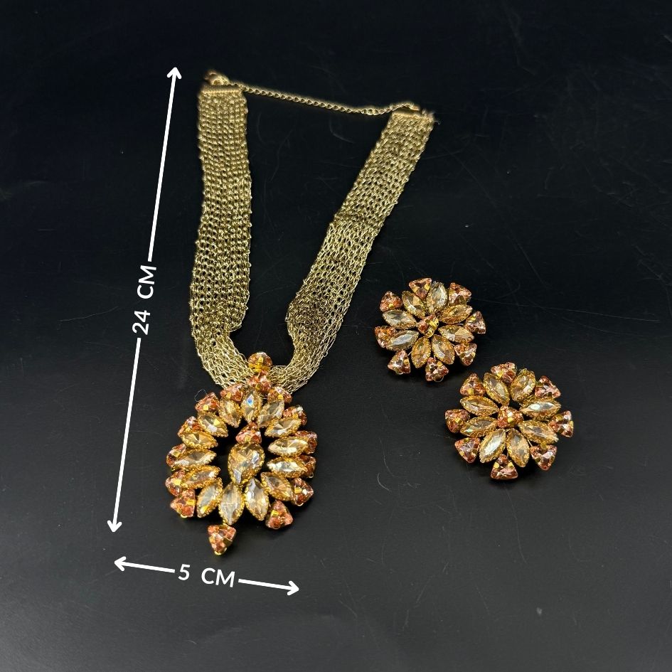 Parure collier et boucles d’oreilles dorée avec cristaux champagne