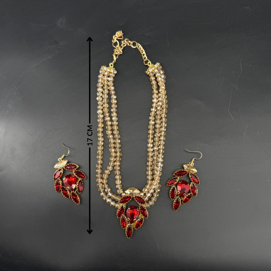 Collier doré et rouge pour soirée