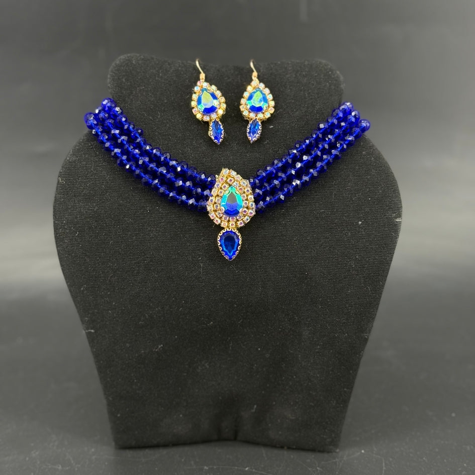 Collier et boucles d’oreilles étoile dorée pour cérémonie bleu roi