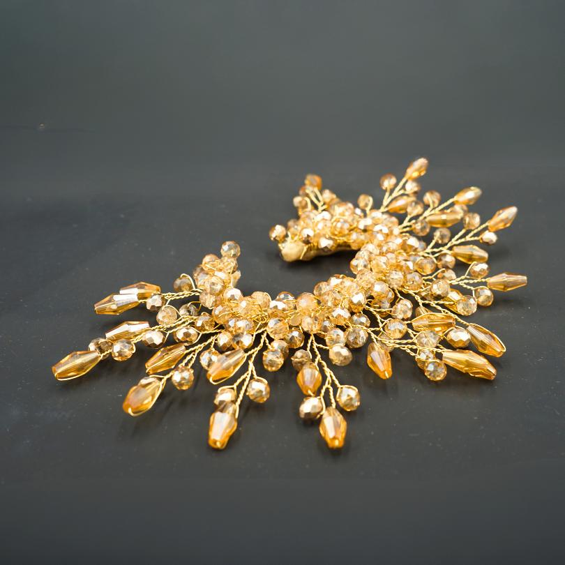 Broche/Boucles d’oreilles dorée, modèle soleil